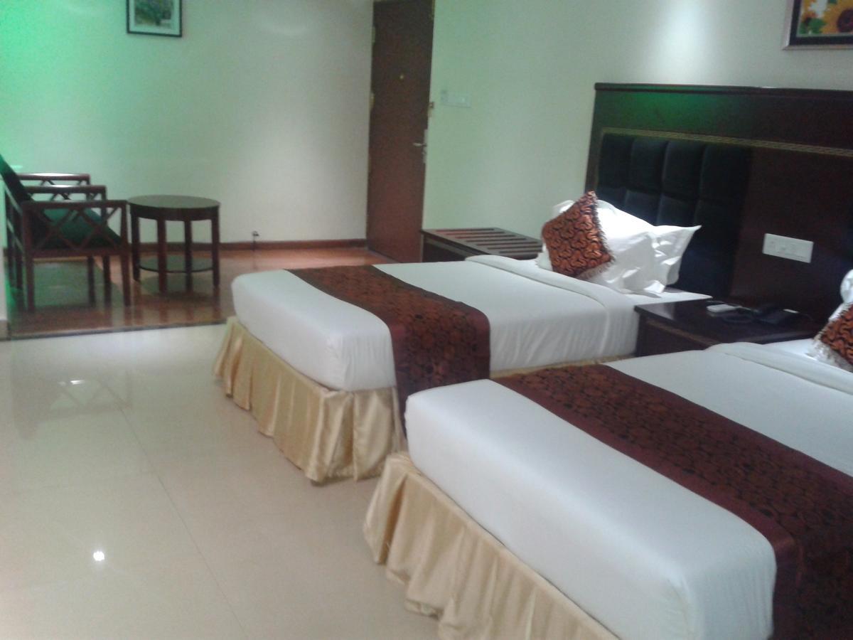 Hotel Hiton Perintalmanna Zimmer foto
