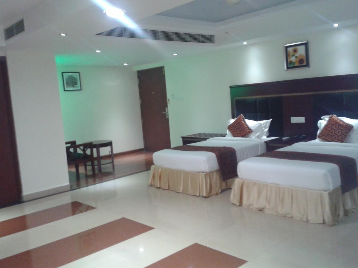 Hotel Hiton Perintalmanna Zimmer foto